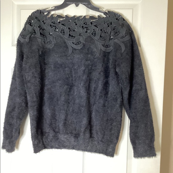 Black Sweater With Decorative Design at neck and shoulders - Picture 2 of 5